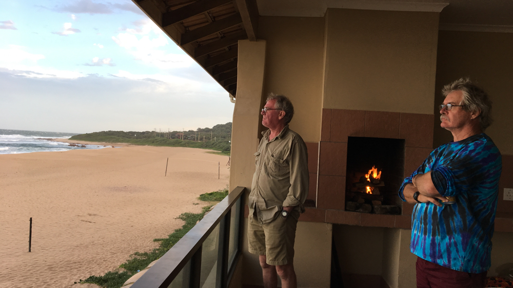 Kevin and Geoff looking out over the INdian Ocean from their apartment.