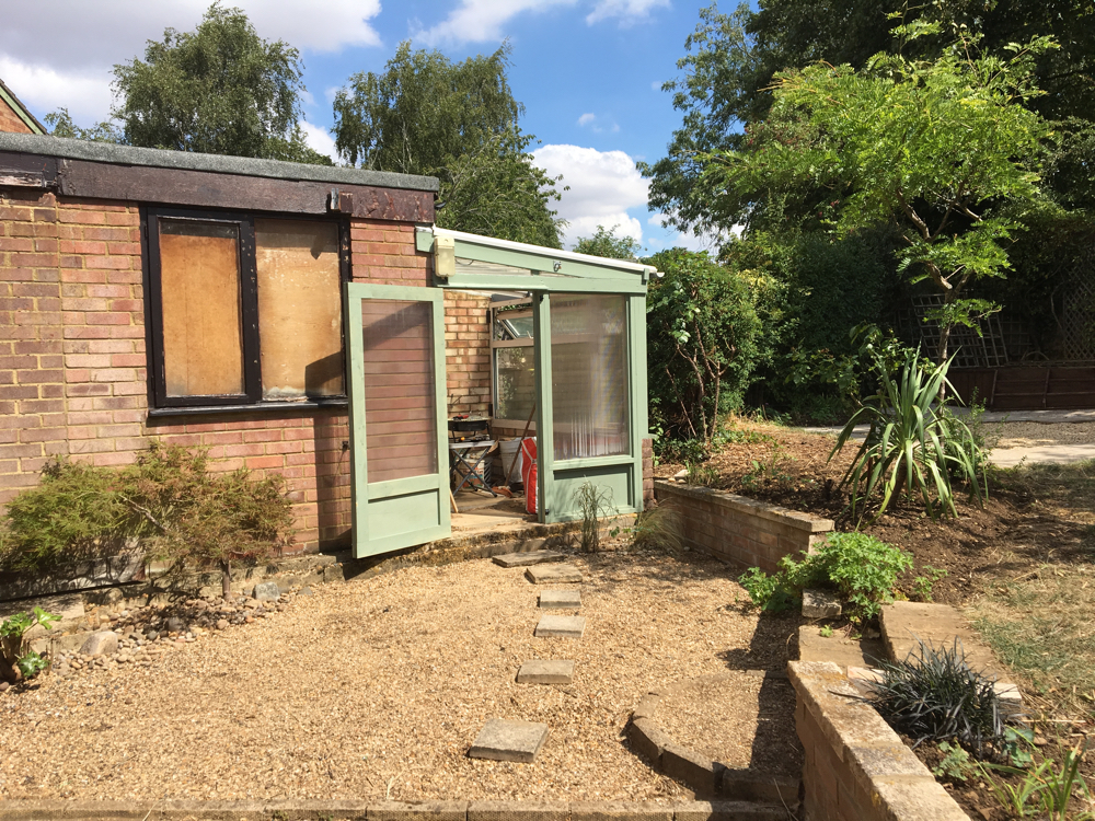 Gravel re-laid and added to, new door and paintwork for the greenhouse and lots of plants removed or trimmed.