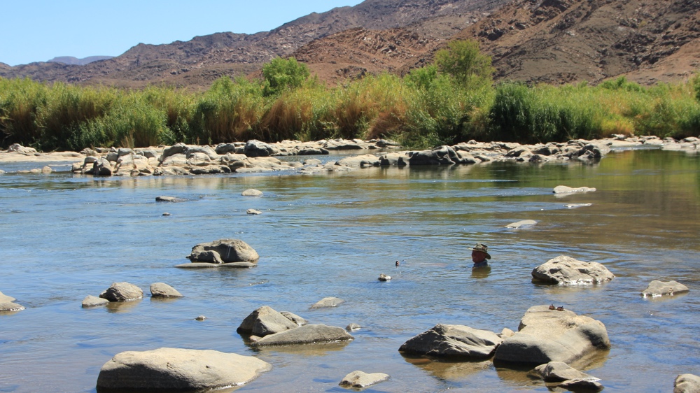 A swim in the river to cool off.