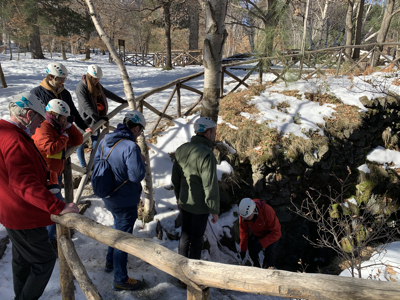 Using a rope to enter the caves