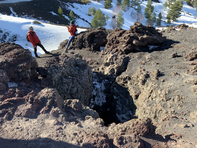 Standing next to the caldera.