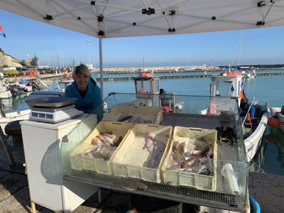 We bought fresh fish from this stall at the harbour.