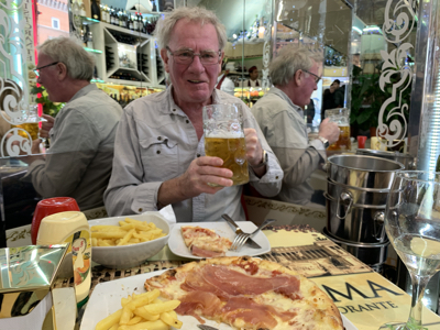 We shared a pizza and fries at a nearby cafe.