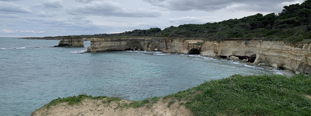 Chalk cliffs with lots of caves and arches.