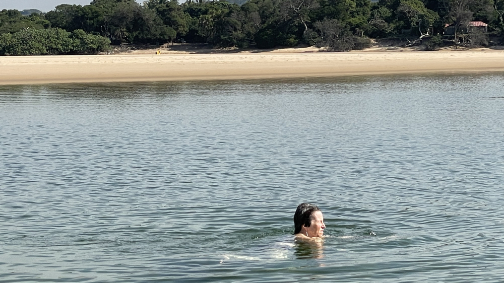 Michelle swimming in the lagoon.