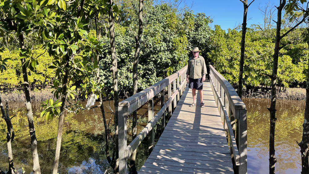 Kevin standing on the new bridge.
