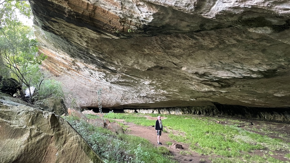 Kevin standing in a huge cavern.
